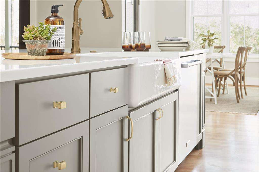 AMEROCK Revitalize 1-1/4" Length Rectangle Cabinet Knob in Champagne Bronze BP55340CZ on Grey