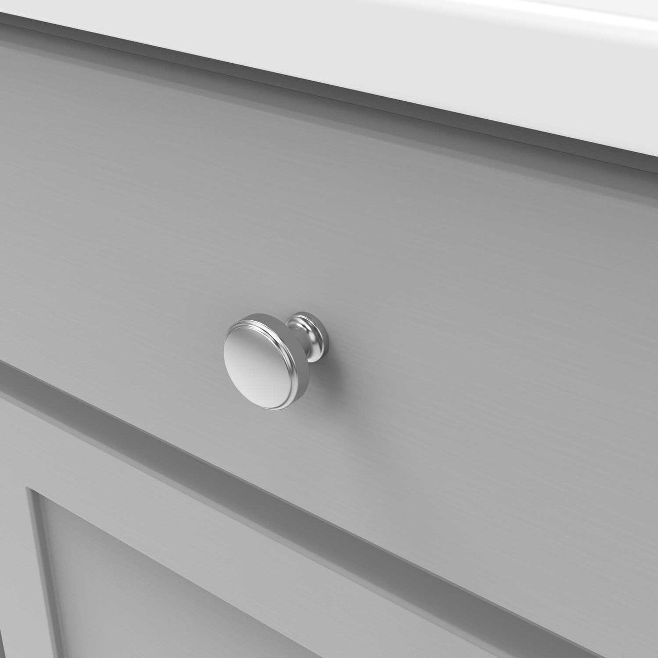 Drawer View of a Chrome 1-1/4" Round Cabinet Knob from Hickory Hardware's Piper Collection H077849-CH