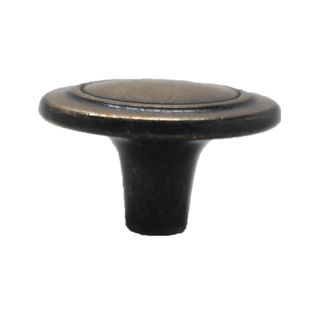 Side View of a Shiny Antique Brass Round Cabinet Knob from Amerock's Designer's Hardware Collection