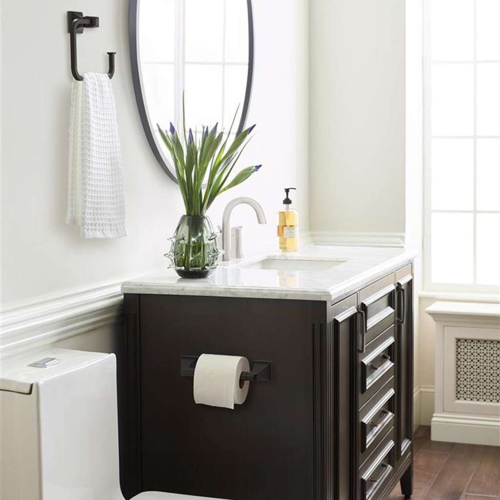 AMEROCK Mulholland Pivoting Toilet Paper Holder in Oil Rubbed Bronze BH36021ORB on Brown