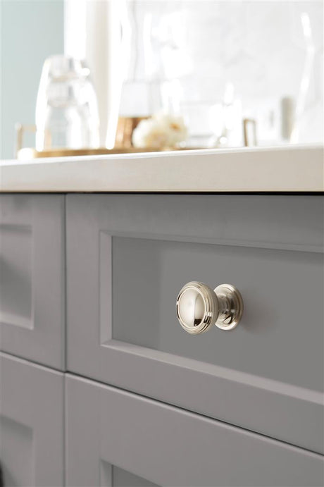AMEROCK Revitalize 1-1/4" Diameter Cabinet Knob in Polished Nickel BP55342PN on Grey