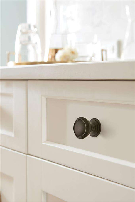 AMEROCK Revitalize 1-1/4" Diameter Cabinet Knob in Black Bronze BP55342BBR on Off White