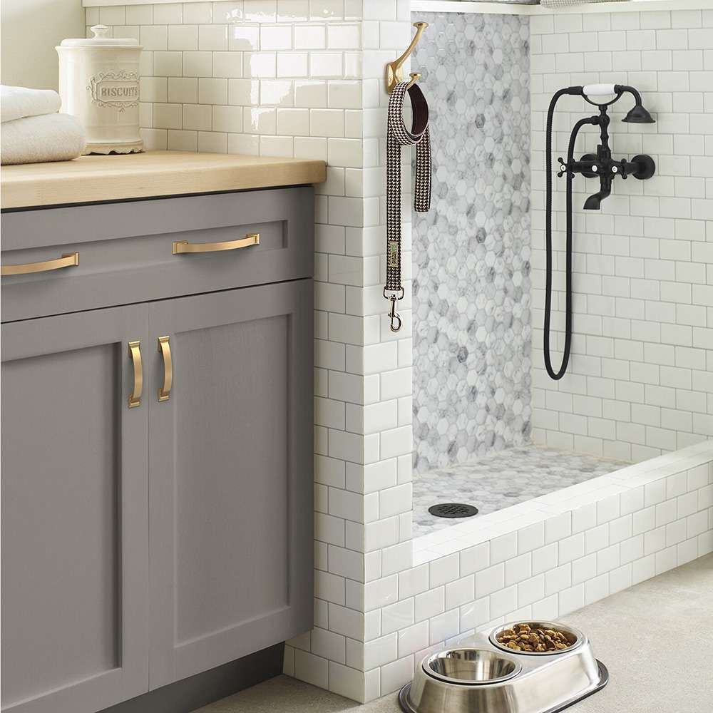 Amerock Candler Handle Cabinet Pull in Champagne Bronze in Gray Bathroom