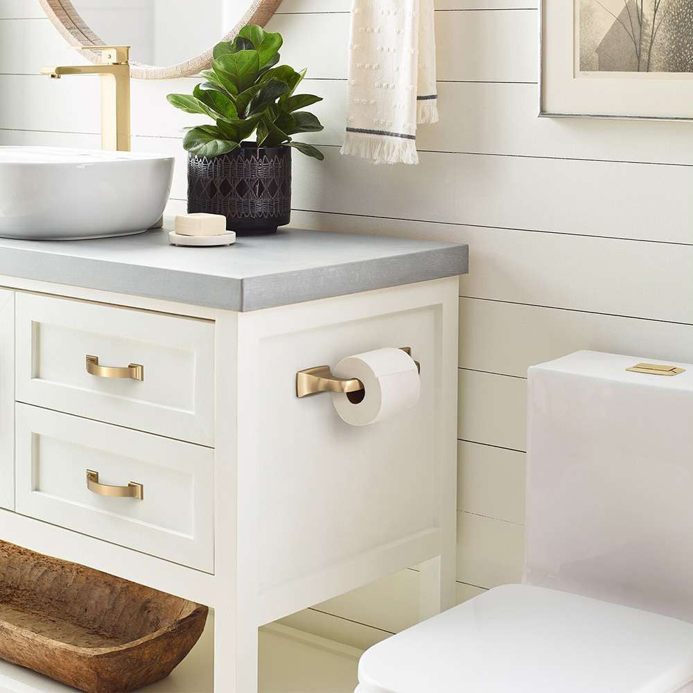 Amerock Candler Handle Cabinet Pull in Champagne Bronze in White Bathroom