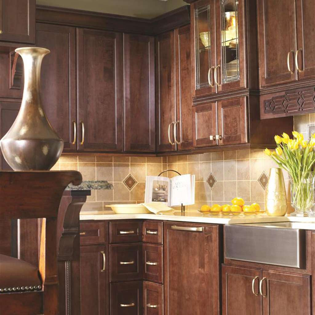 Amerock Revitalize in Gilded Bronze on Cherry Wood Kitchen