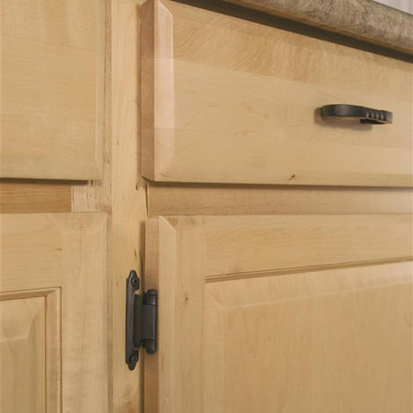 AMEROCK Self Closing Face Mount Variable Overlay Cabinet Hinge (pair) in Flat Black BPR3429FB Mounted on Wood