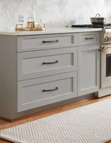 AMEROCK Revitalize Cabinet Hardware Collection in Oil Rubbed Bronze on Gray