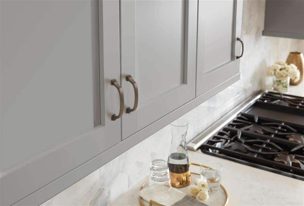 AMEROCK Revitalize Cabinet Hardware Collection in Oil Rubbed Bronze on Grey
