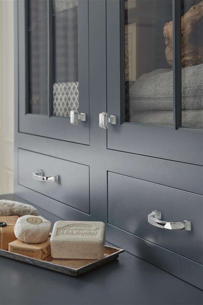 AMEROCK Revitalize Cabinet Hardware Collection Polished Chrome on Blue