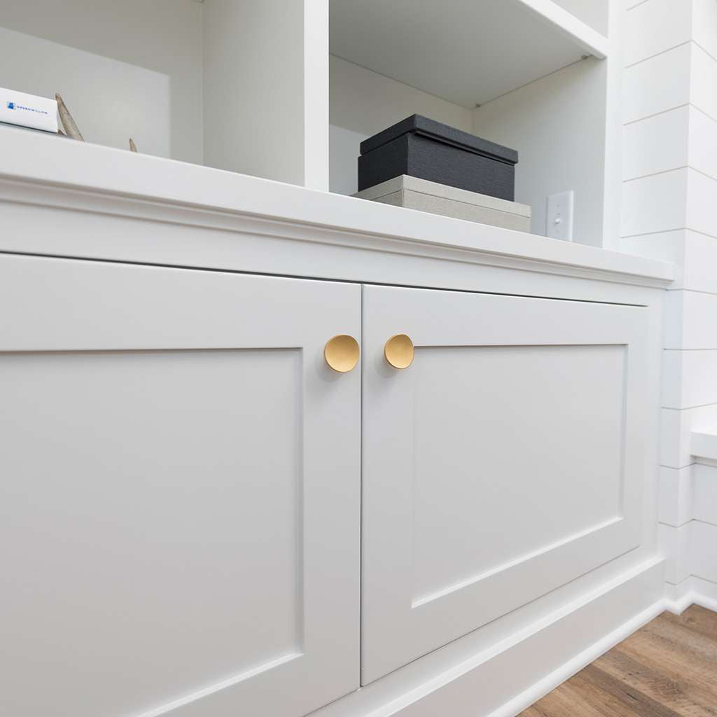 BELWITH-KEELER Vale Round Cabinet Knob in Brushed Golden Brass 1-3/4" Diameter B076526-BGB Mounted on White