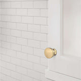 AMEROCK Chalice 1-1/4" Diameter Cabinet Knob in Champagne Bronze BP37022CZ Mounted