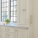 AMEROCK Faircrest 2" Length Wrapped Bar Knob Cabinet Pull in Champagne Bronze BP37461CZ on White
