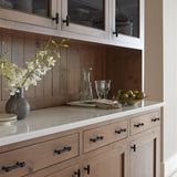 AMEROCK Faircrest 2" Length Wrapped Bar Knob Cabinet Pull in Matte Black BP37461MB on Brown