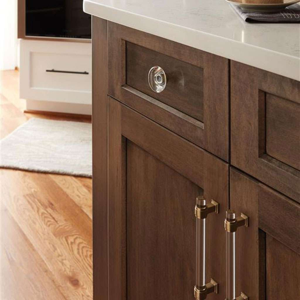 AMEROCK Glacio 1-3/4" Diameter Glass Cabinet Knob in Clear and Golden Champagne BP36652CG10 on Brown