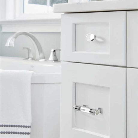 AMEROCK Glacio 1-3/4" Length Glass Oval Cabinet Knob in Chrome and Clear BP36651C26 on White
