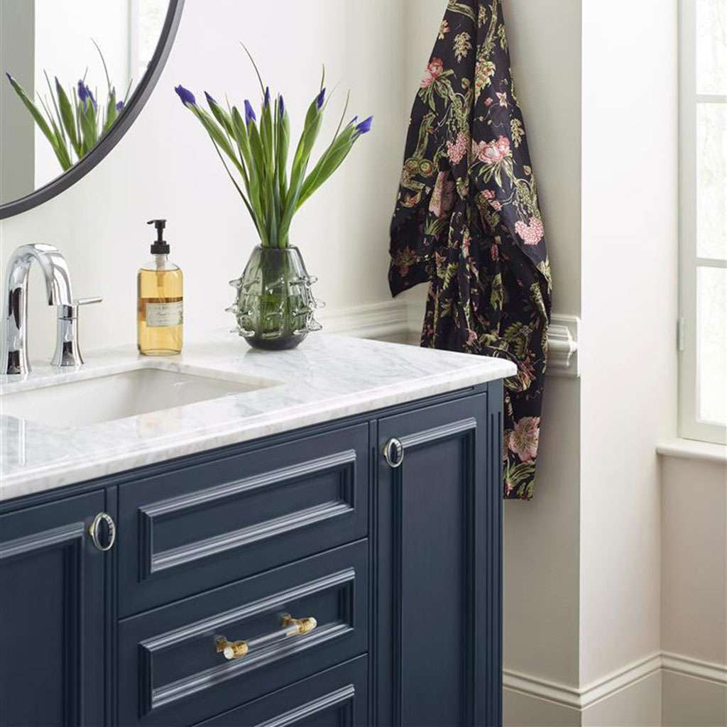 AMEROCK Glacio 1-3/4" Length Glass Oval Cabinet Knob in Clear and Champagne Bronze BP36651CCZ on Blue