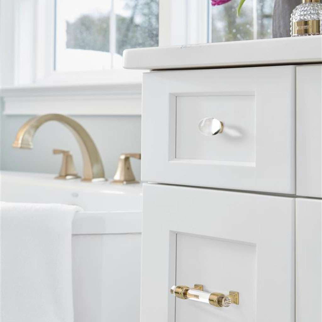 AMEROCK Glacio 1-3/4" Length Glass Oval Cabinet Knob in Clear and Champagne Bronze BP36651CCZ on White