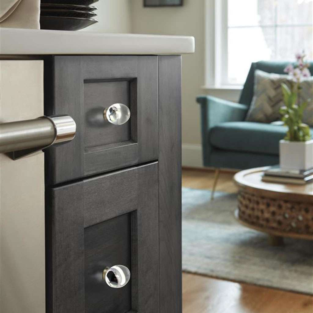 AMEROCK Glacio 1-3/4" Length Glass Oval Cabinet Knob in Clear and Golden Champagne BP36651CBBZ on Black