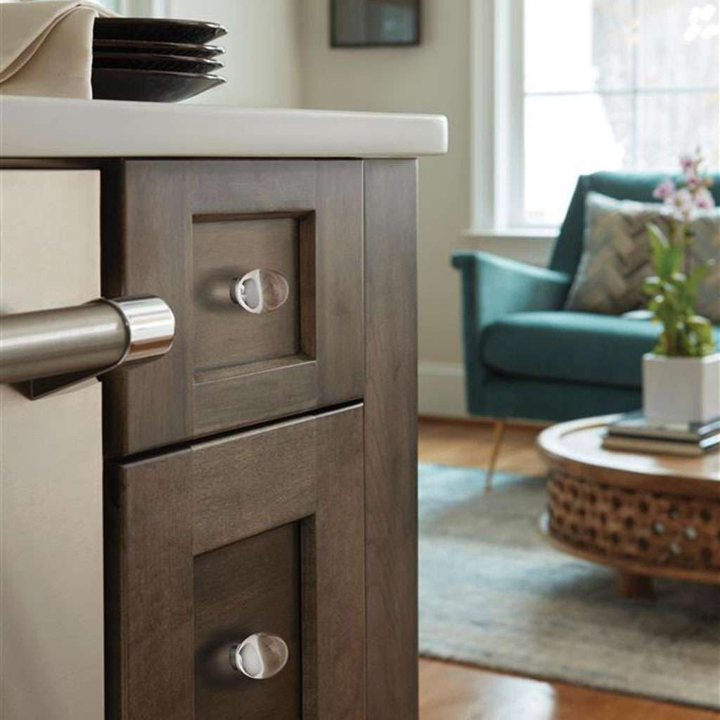 AMEROCK Glacio 1-3/4" Length Glass Oval Cabinet Knob in Clear and Gunmetal BP36651CGM on Brown