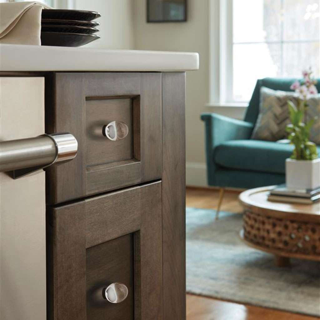 AMEROCK Glacio 1-3/4" Length Glass Oval Cabinet Knob in Clear and Oil Rubbed Bronze BP36651CORB on Brown