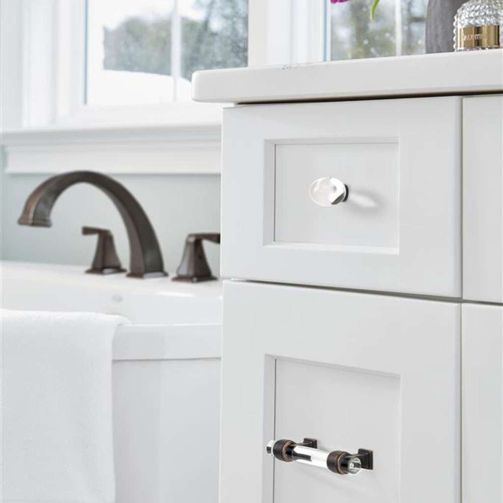 AMEROCK Glacio 1-3/4" Length Glass Oval Cabinet Knob in Clear and Oil Rubbed Bronze BP36651CORB on White