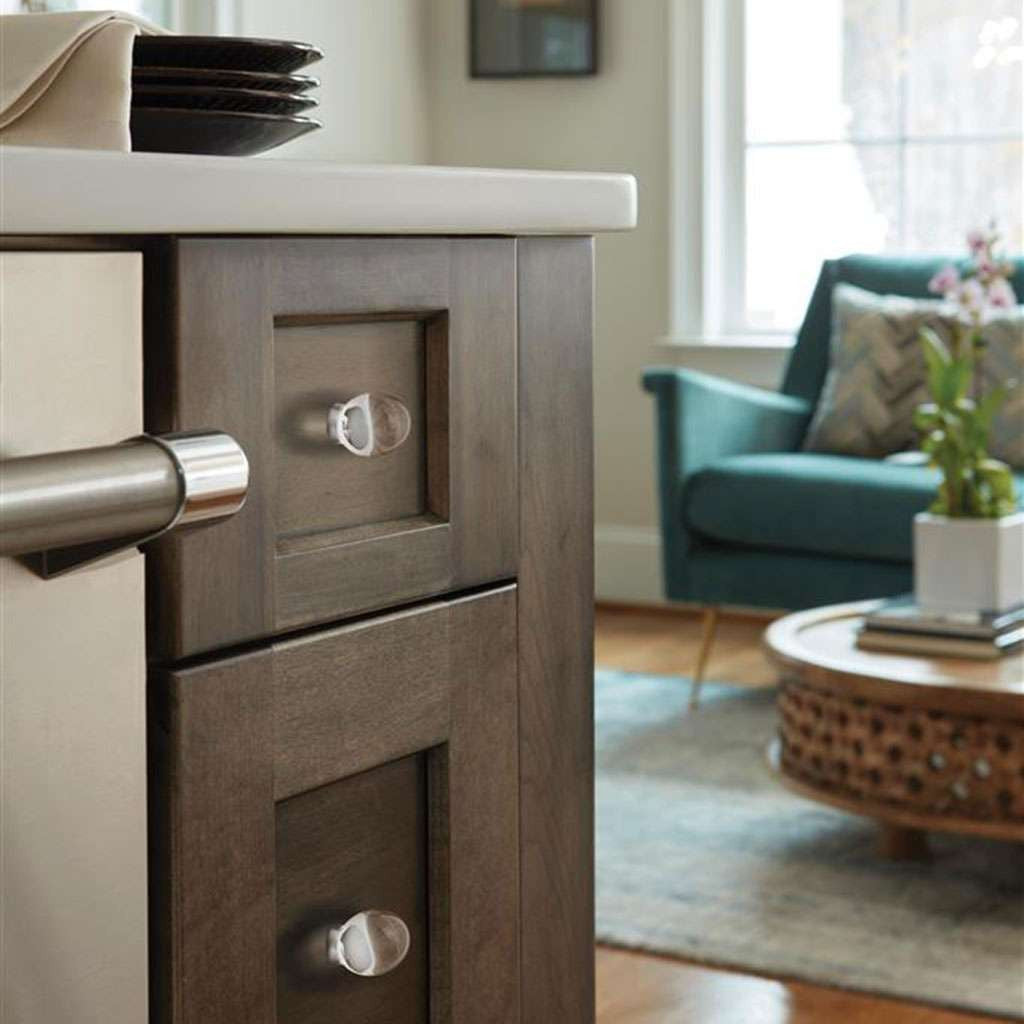 AMEROCK Glacio 1-3/4" Length Glass Oval Cabinet Knob in Clear and Polished Nickel BP36651CPN on Brown