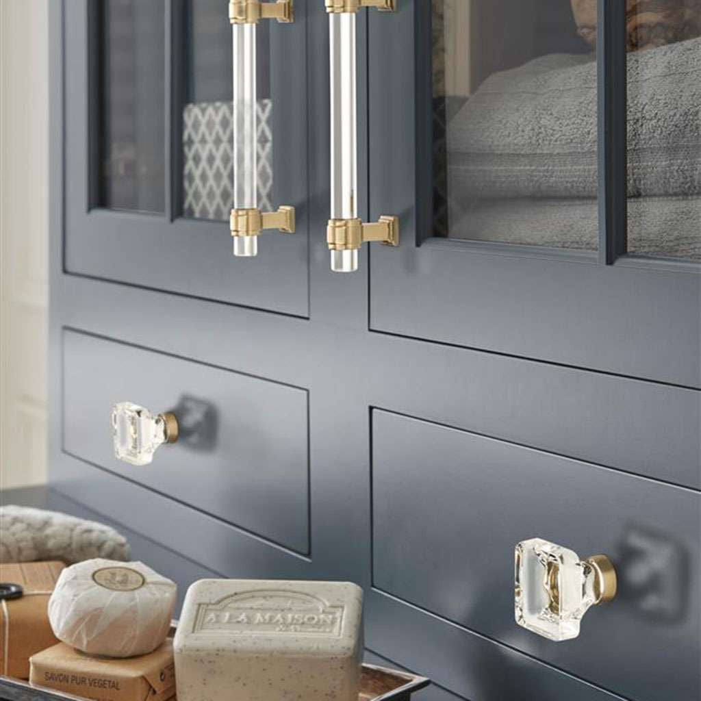 AMEROCK Glacio 1-3/8" Length Glass Square Cabinet Knob in Clear and Champagne Bronze BP36653CCZ on Blue