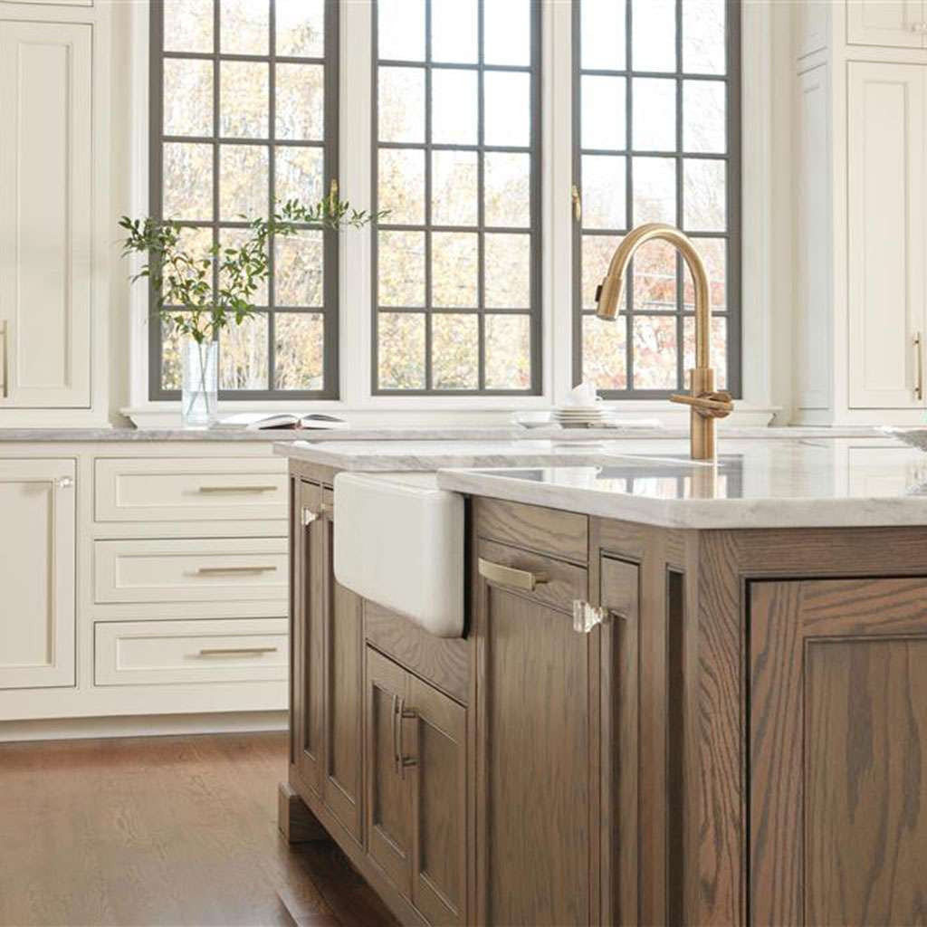 AMEROCK Glacio 1-3/8" Length Glass Square Cabinet Knob in Clear and Golden Champagne BP36653CBBZ on Wood