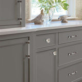 AMEROCK Glacio 1-3/8" Length Glass Square Cabinet Knob in Clear and Oil Rubbed Bronze BP36651CORB on Gray