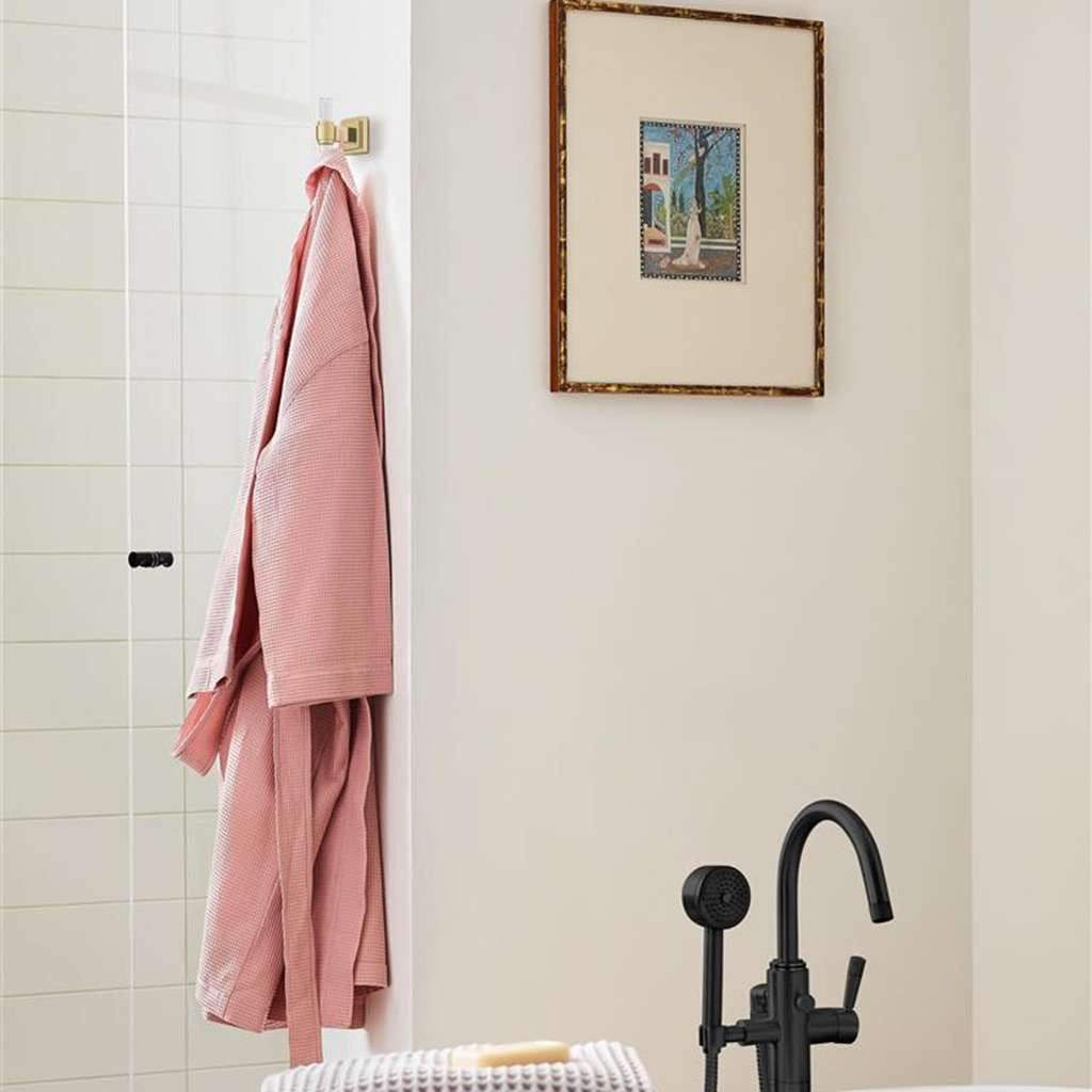 AMEROCK Glacio Single Prong Hook in Clear and Golden Champagne BH36060CBBZ in Black Bathroom