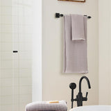 AMEROCK Glacio Towel Bar in Clear and Matte Black 18" BH36063CMB in Beige Bathroom