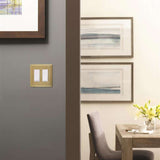 AMEROCK Mulholland GFI Rocker Switch Wall Plate in Golden Champagne Double BP36519BBZ Mounted
