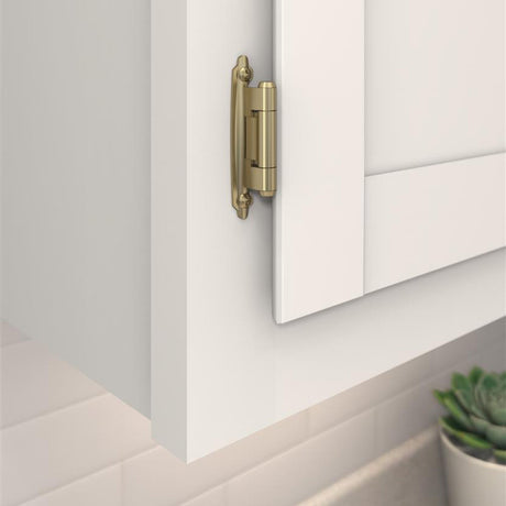 AMEROCK Self Closing Reverse Bevel Variable Overlay Cabinet Hinge (pair) in Golden Champagne BPR7630BBZ Mounted