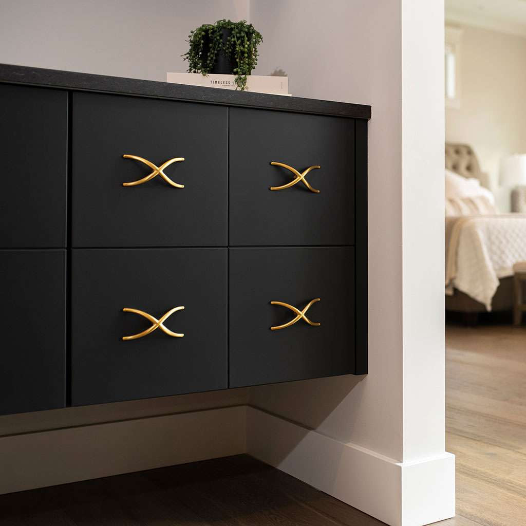 Belwith Keeler Bijou X 4-3/4" Long Cabinet Knob in Brushed Golden Brass B079063-BGB on Black